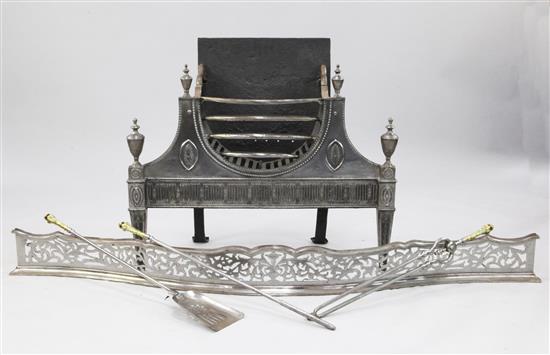 A 19th century George III style steel fire grate, W.2ft 10.5in.